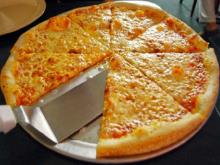 Father & Son enjoying New York Pizza & Pasta